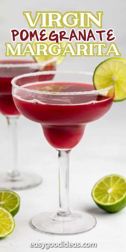 Two glasses of bright red virgin pomegranate margarita, garnished with lime slices on the rim. Whole and halved limes sit nearby. Text above reads, Virgin Pomegranate Margarita.