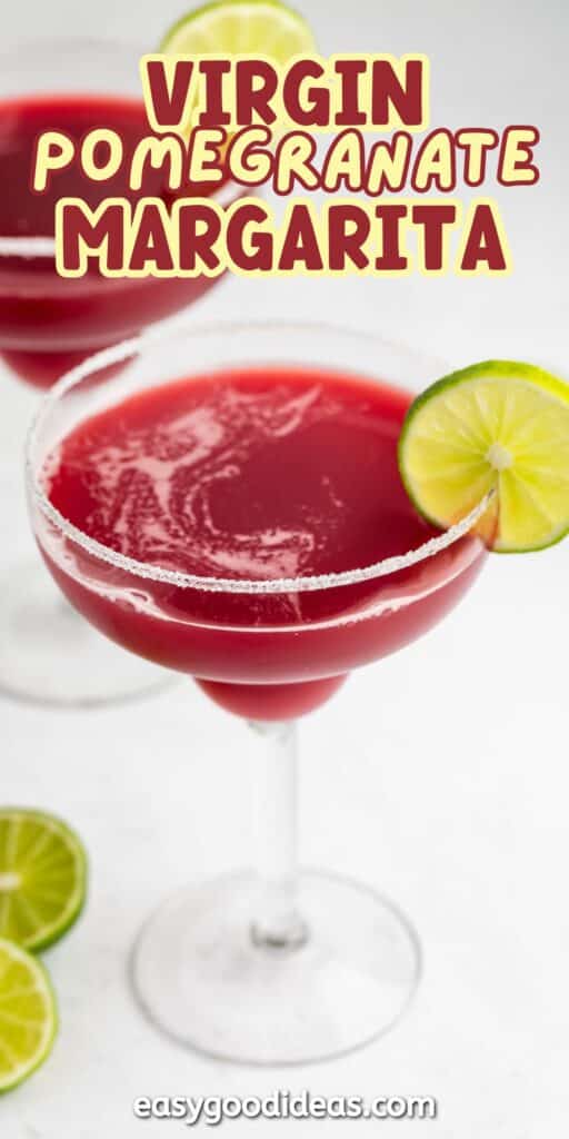 Two glasses of vibrant red virgin pomegranate margarita with salted rims and lime wedges, set on a white surface. Text above reads “Virgin Pomegranate Margarita.”.