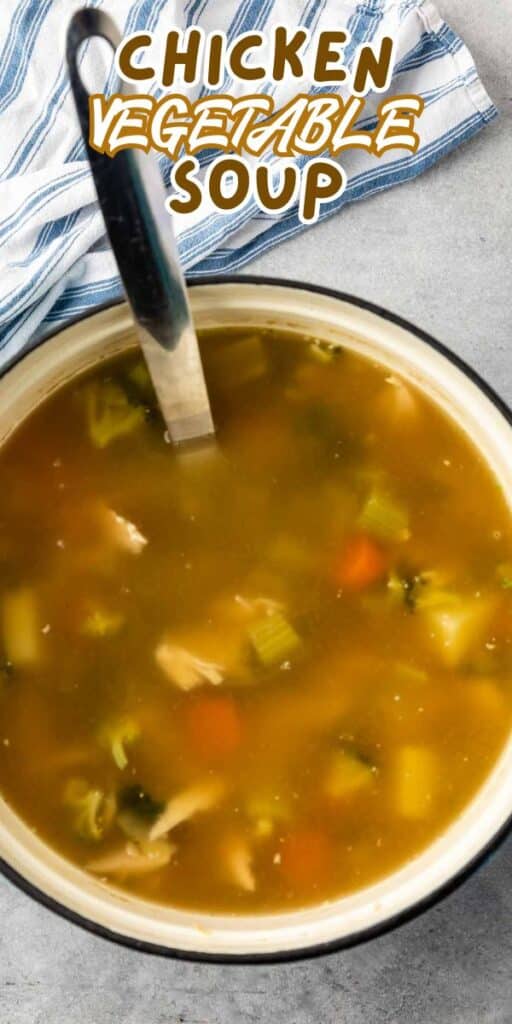 A pot of chicken vegetable soup with visible chunks of chicken, carrots, and celery, a ladle in the soup, and a striped kitchen towel nearby. Text above reads Chicken Vegetable Soup.
